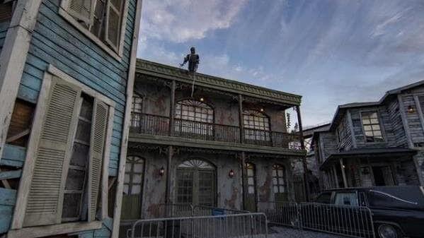 Woman blames haunted house company, worker for injuries